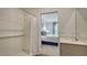 Bathroom with shower and tub, and access to the bedroom at 4519 Boxelder Avenue, Parrish, FL 34219