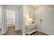 Bright entryway with a table, mirror, and view of bathroom at 4519 Boxelder Avenue, Parrish, FL 34219