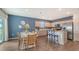 Modern kitchen with stainless steel appliances and island at 4519 Boxelder Avenue, Parrish, FL 34219