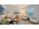 Home office featuring two chairs, a desk, and large window at 4519 Boxelder Avenue, Parrish, FL 34219