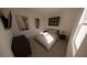 Bright bedroom with striped bedding and modern nightstands at 4523 Boxelder Avenue, Parrish, FL 34219