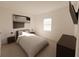 Spacious bedroom with a large bed and contemporary decor at 4523 Boxelder Avenue, Parrish, FL 34219