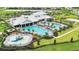 Resort-style pool with water features, clubhouse, and expansive green areas at 4814 Sparkling Sea Ln, Lakewood Ranch, FL 34211
