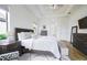 Spacious bedroom with wood furniture and large windows at 4814 Sparkling Sea Ln, Lakewood Ranch, FL 34211
