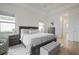 Bright bedroom featuring a comfortable bed and ample natural light at 4814 Sparkling Sea Ln, Lakewood Ranch, FL 34211