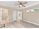 Bedroom featuring modern lighting, two closets and en suite bathroom at 5429 Potter St, Sarasota, FL 34232