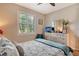 Comfortable bedroom with dresser and window seating at 5931 Caspian Tern Dr, Sarasota, FL 34238