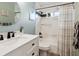 Clean bathroom with a bathtub, shower, and modern vanity at 5940 Driftwood Ave # 15, Sarasota, FL 34231
