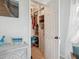 Well-organized walk-in closet with ample shelving and drawers at 5940 Driftwood Ave # 15, Sarasota, FL 34231