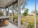 Enjoy the view from this relaxing Florida room with sliding glass doors at 5940 Driftwood Ave # 15, Sarasota, FL 34231