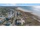 Aerial view of beach house with ocean view, located close to other beach homes at 600/602 Beach Rd # 1 & 2, Sarasota, FL 34242