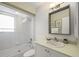 Clean bathroom with shower/tub combo, vanity, and mirror at 600/602 Beach Rd # 1 & 2, Sarasota, FL 34242