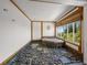 Unique bathroom with a sunken stone tub and a pebble floor at 600/602 Beach Rd # 1 & 2, Sarasota, FL 34242