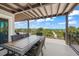 Outdoor patio with dining table and ocean view at 600/602 Beach Rd # 1 & 2, Sarasota, FL 34242