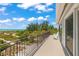 Spacious ocean view deck with white chairs and tranquil setting at 600/602 Beach Rd # 1 & 2, Sarasota, FL 34242