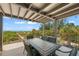 Outdoor patio with dining table and ocean view at 600/602 Beach Rd # 1 & 2, Sarasota, FL 34242
