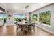 Round dining table with chairs, offering ocean views at 600/602 Beach Rd # 1 & 2, Sarasota, FL 34242