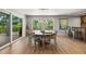 Round wooden dining table with ocean views at 600/602 Beach Rd # 1 & 2, Sarasota, FL 34242