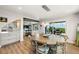 Dining room with large round table and ocean view at 600/602 Beach Rd # 1 & 2, Sarasota, FL 34242