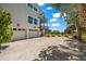 Two-car garage and exterior of home with beach access at 600/602 Beach Rd # 1 & 2, Sarasota, FL 34242