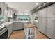 Open kitchen boasts stainless steel appliances and ocean views at 600/602 Beach Rd # 1 & 2, Sarasota, FL 34242
