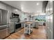 Bright kitchen with stainless steel appliances and an island at 600/602 Beach Rd # 1 & 2, Sarasota, FL 34242