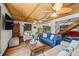 Spacious living room with hardwood floors, comfortable seating, and a large flat-screen TV at 600/602 Beach Rd # 1 & 2, Sarasota, FL 34242