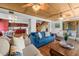 Comfortable living room with hardwood floors and blue sofa at 600/602 Beach Rd # 1 & 2, Sarasota, FL 34242