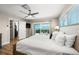Bright main bedroom with king-size bed and stunning ocean views at 600/602 Beach Rd # 1 & 2, Sarasota, FL 34242
