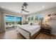 Main bedroom with ocean view, king bed, and wood floors at 600/602 Beach Rd # 1 & 2, Sarasota, FL 34242