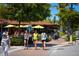 People strolling near shops and restaurants on a sunny day at 600/602 Beach Rd # 1 & 2, Sarasota, FL 34242