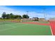 Two tennis courts with green and red surface at 600/602 Beach Rd # 1 & 2, Sarasota, FL 34242
