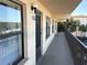 Building hallway with view of apartment entrance and windows at 625 30Th W Ave # G309, Bradenton, FL 34205