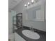 Bathroom with a shower, toilet, and shelving unit at 6262 142Nd N Ave # 805, Clearwater, FL 33760