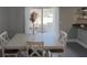 Dining area with sliding glass doors leading to patio at 6262 142Nd N Ave # 805, Clearwater, FL 33760