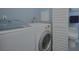 Laundry room with washer, dryer, and additional toilet at 6262 142Nd N Ave # 805, Clearwater, FL 33760