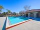 Community pool with surrounding lounge area at 6262 142Nd N Ave # 805, Clearwater, FL 33760