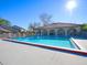 Community pool with surrounding lounge area at 6262 142Nd N Ave # 805, Clearwater, FL 33760