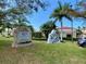 Exterior view of Venice Art Center, featuring signage, landscaping, and artwork at 636 Lakescene Drive Dr, Venice, FL 34293