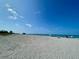 Expansive Venice Beach showcasing sand, ocean, and beachgoers at 636 Lakescene Drive Dr, Venice, FL 34293