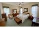 Spacious bedroom with a comfortable bed and plenty of natural light at 636 Lakescene Drive Dr, Venice, FL 34293