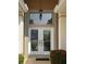 Double entry doors with etched glass and sidelights at 636 Lakescene Drive Dr, Venice, FL 34293