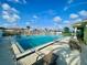 Inviting community swimming pool with lounge chairs at 636 Lakescene Drive Dr, Venice, FL 34293