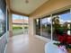 Enjoyable screened in porch with view of backyard at 636 Lakescene Drive Dr, Venice, FL 34293