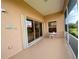 Relaxing screened porch with sliding glass doors at 636 Lakescene Drive Dr, Venice, FL 34293
