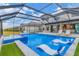 Relaxing pool and spa with covered patio at 6375 Grandview Hill Ct, Bradenton, FL 34203