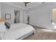 Bright bedroom with a comfortable bed and access to an exterior door at 7817 Passionflower Dr, Sarasota, FL 34241