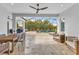 Spacious covered patio with pool, outdoor seating, and dining area at 7817 Passionflower Dr, Sarasota, FL 34241