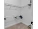 Large walk-in closet with wire shelving and a hanging rod at 7817 Passionflower Dr, Sarasota, FL 34241