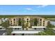 Condo building with parking and lake view at 7911 Grand Estuary Trl # 106, Bradenton, FL 34212